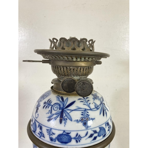 477 - A late 19th/early 20th century FS & Co Ltd Duplex brass and ceramic oil lamp