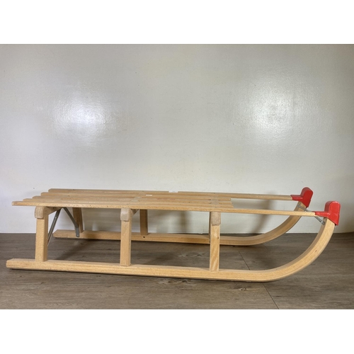 482 - A vintage Gloco Davoser beech sledge - approx. 46cm high x 110cm long x 27cm wide