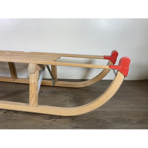 482 - A vintage Gloco Davoser beech sledge - approx. 46cm high x 110cm long x 27cm wide