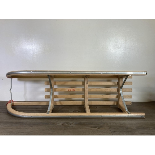 482 - A vintage Gloco Davoser beech sledge - approx. 46cm high x 110cm long x 27cm wide