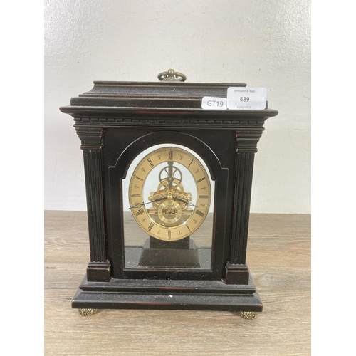 489 - Two quartz clocks, one London Clock Company carriage clock and one mantel clock