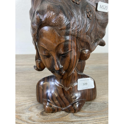 509 - A vintage Balinese carved ebony female bust - approx. 24cm high