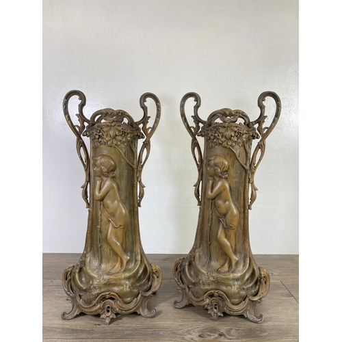 510 - A pair of Art Nouveau Fabrication Francaise of Paris patinated spelter two handled vases after Arist... 