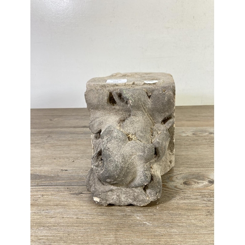 516 - A medieval carved stone corbel - approx. 32cm x 18cm x 17cm