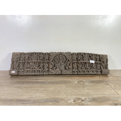 534 - A mid 20th century Indian carved hardwood wall plaque - approx. 85cm wide x 20cm deep