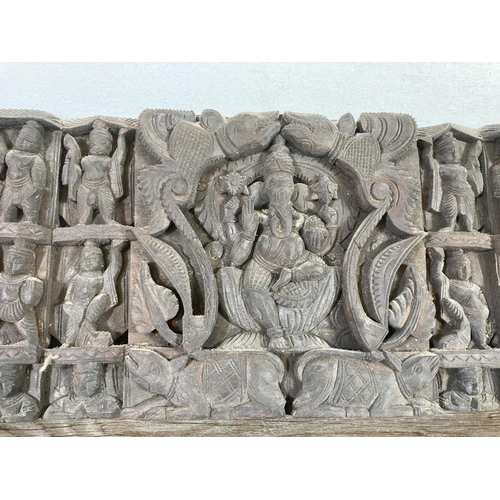 534 - A mid 20th century Indian carved hardwood wall plaque - approx. 85cm wide x 20cm deep