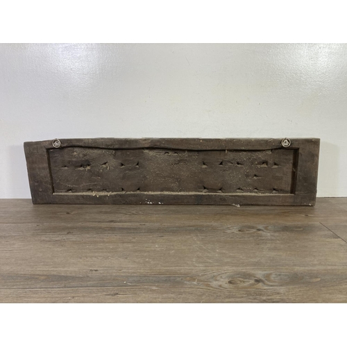 534 - A mid 20th century Indian carved hardwood wall plaque - approx. 85cm wide x 20cm deep