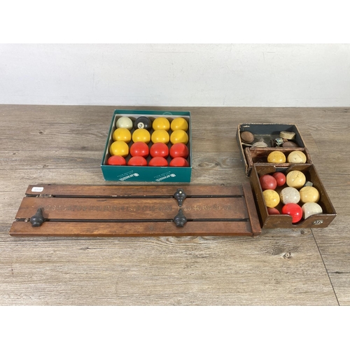 540 - An early 20th century E. J. Riley Ltd Accrington mahogany snooker scoreboard with balls