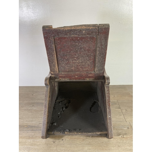 545 - A late 19th/early 20th century mahogany coal scuttle with brass handle - approx. 34cm high x 35cm wi... 