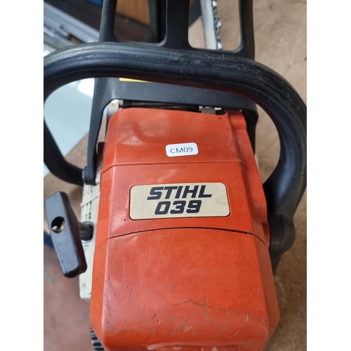 832 - A Stihl 039 petrol chainsaw with 18