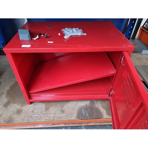 839 - A red metal tool cabinet approx 60cm x 40cm x 43cm