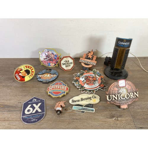 483 - A collection of beer pump clips/badges