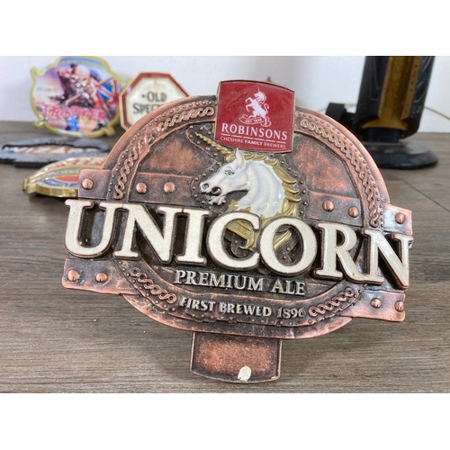 483 - A collection of beer pump clips/badges