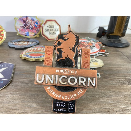 483 - A collection of beer pump clips/badges