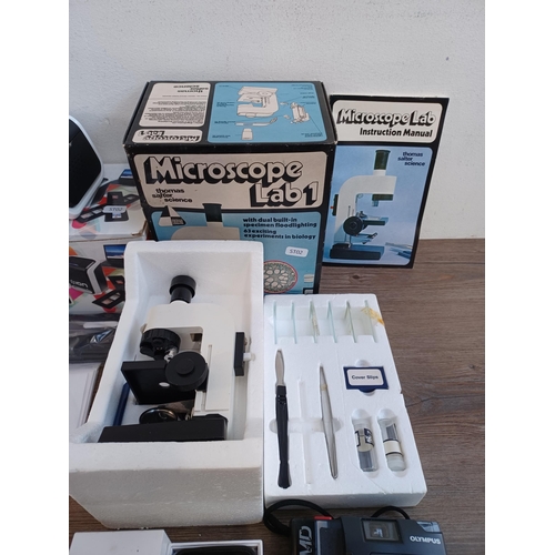 654 - A collection of tech, cameras and optical instruments to include boxed Buffalo MiniStation 500gb USB... 