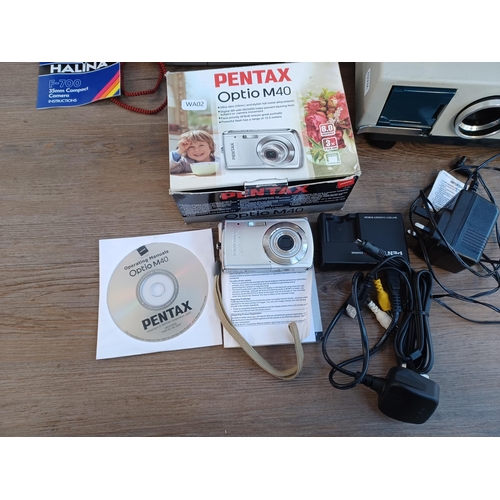 661 - Five items, one boxed Pentax Optio M40 digital camera with accessories and instruction manual, one b... 