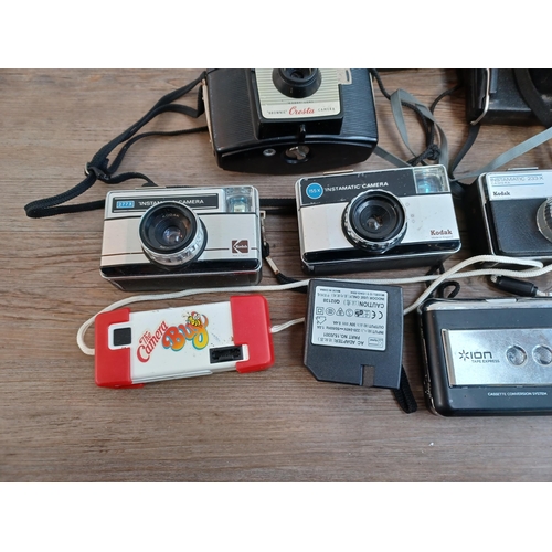 662 - A collection of cameras to include two Kodak EK2 instant, Polaroid Swinger Sentinal instant, three K... 