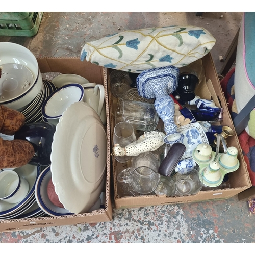 873 - Five boxes containing elephant stuffed toys, Adams blue and white candle stick, wicker basket, suitc... 