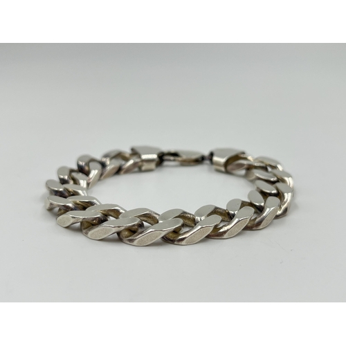 2121 - A .925 silver 18.5cm curb link bracelet - approx. gross weight 50.8 grams