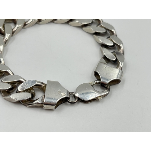 2121 - A .925 silver 18.5cm curb link bracelet - approx. gross weight 50.8 grams