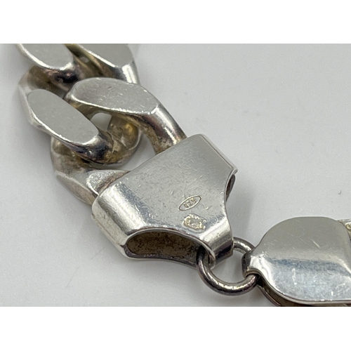 2121 - A .925 silver 18.5cm curb link bracelet - approx. gross weight 50.8 grams