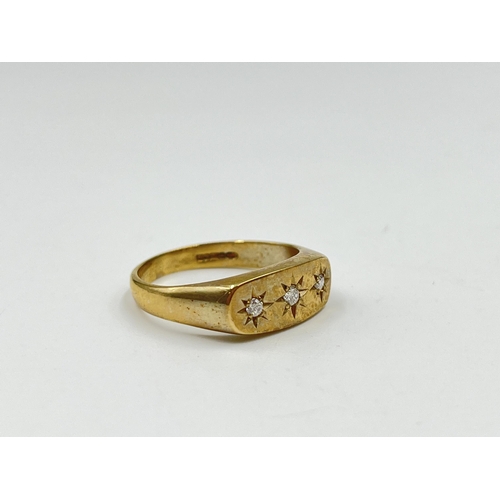 2126 - A hallmarked Birmingham 9ct gold diamond trilogy ring, size P - approx. gross weight 4.18 grams