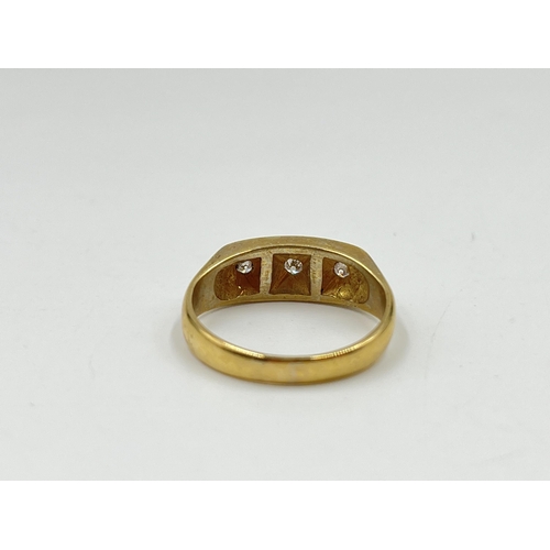 2126 - A hallmarked Birmingham 9ct gold diamond trilogy ring, size P - approx. gross weight 4.18 grams