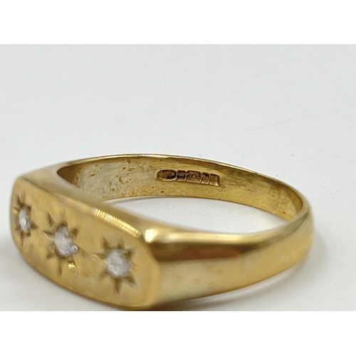 2126 - A hallmarked Birmingham 9ct gold diamond trilogy ring, size P - approx. gross weight 4.18 grams