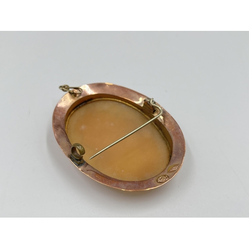 2143 - A 9ct gold framed cameo pin brooch - approx. gross weight 9 grams and approx. 5cm x 4cm