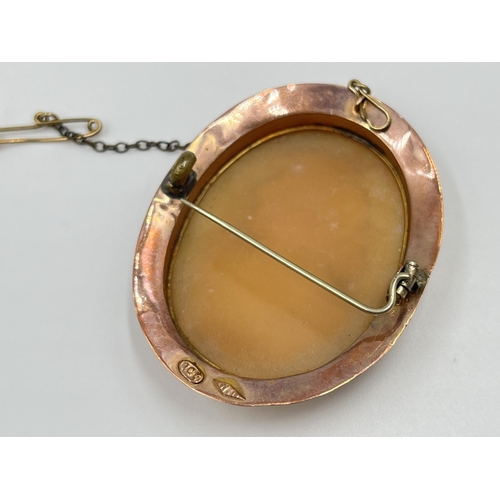 2143 - A 9ct gold framed cameo pin brooch - approx. gross weight 9 grams and approx. 5cm x 4cm