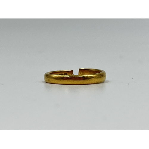 2144 - A hallmarked Birmingham 22ct gold wedding band - approx. gross weight 3.7 grams