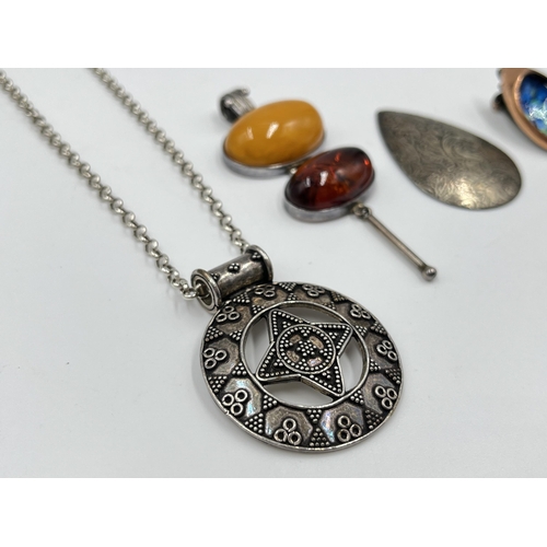 2147 - Five pieces of vintage jewellery to include .925 silver amber doublet pendant, .925 silver pendant n... 