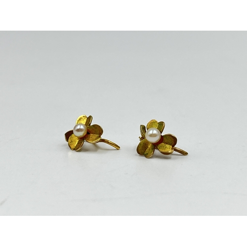 2151 - Two pairs of earrings, one yellow metal and one 9ct gold with CZ stones - approx. gross weight 0.65 ... 