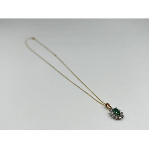 2153 - A 9ct gold emerald and CZ pendant necklace - approx. gross weight 1.15 grams