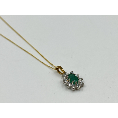 2153 - A 9ct gold emerald and CZ pendant necklace - approx. gross weight 1.15 grams