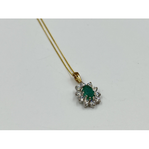 2153 - A 9ct gold emerald and CZ pendant necklace - approx. gross weight 1.15 grams