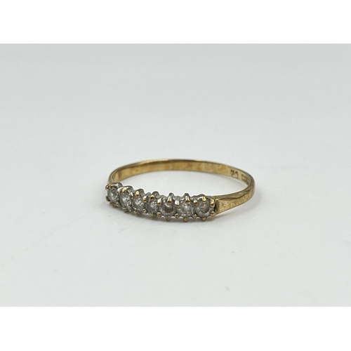 2157 - A hallmarked Birmingham 9ct gold CZ seven stone ring, size Q - approx. gross weight 1.13 grams