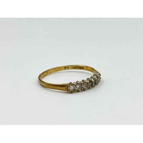 2157 - A hallmarked Birmingham 9ct gold CZ seven stone ring, size Q - approx. gross weight 1.13 grams