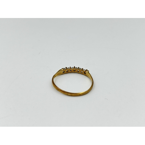 2157 - A hallmarked Birmingham 9ct gold CZ seven stone ring, size Q - approx. gross weight 1.13 grams