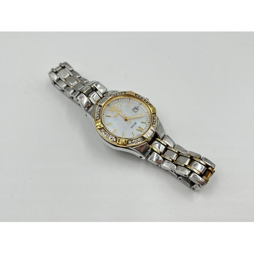 2212 - A Seiko Solar lady's wristwatch with mother of pearl dial and inset diamonds to bezel - ref. V137-0A... 