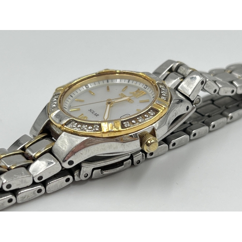 2212 - A Seiko Solar lady's wristwatch with mother of pearl dial and inset diamonds to bezel - ref. V137-0A... 