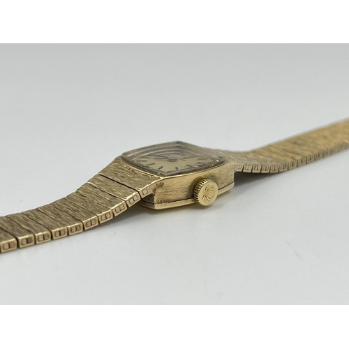 2214 - A 1973 Omega cal. 485 mechanical 9ct gold cased lady's wristwatch with 9ct gold Omega strap - approx... 