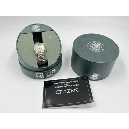 2215 - A boxed Citizen Eco-Drive lady's wristwatch with mother of pearl dial and inset diamonds to bezel - ... 