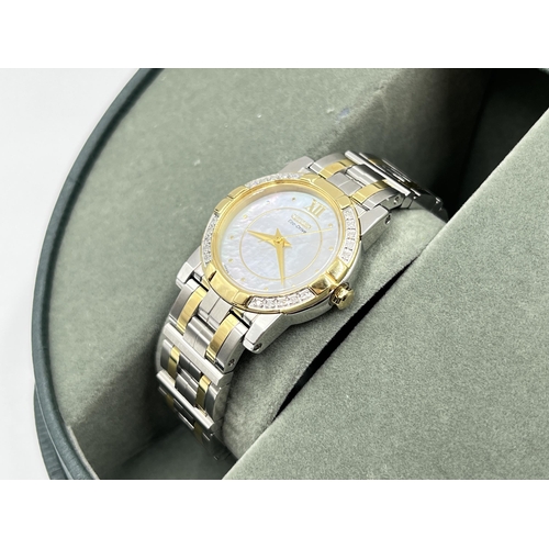 2215 - A boxed Citizen Eco-Drive lady's wristwatch with mother of pearl dial and inset diamonds to bezel - ... 