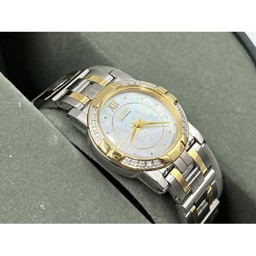 2215 - A boxed Citizen Eco-Drive lady's wristwatch with mother of pearl dial and inset diamonds to bezel - ... 