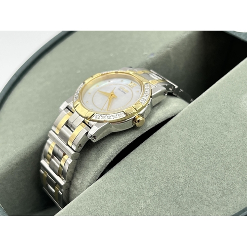 2215 - A boxed Citizen Eco-Drive lady's wristwatch with mother of pearl dial and inset diamonds to bezel - ... 