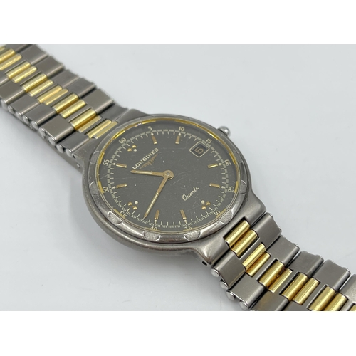 2221 - A Longines Conquest quartz 33mm wristwatch