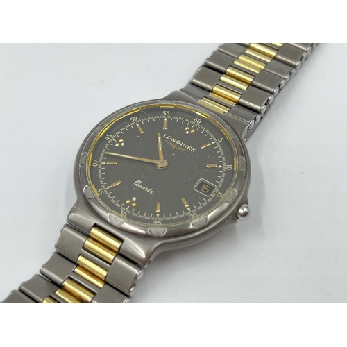 2221 - A Longines Conquest quartz 33mm wristwatch