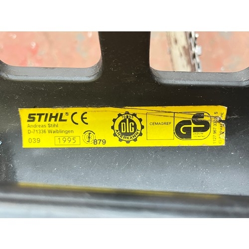 832 - A Stihl 039 petrol chainsaw with 18