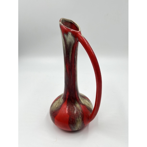 295 - A Canadian studio pottery jug - approx. 20.5cm high